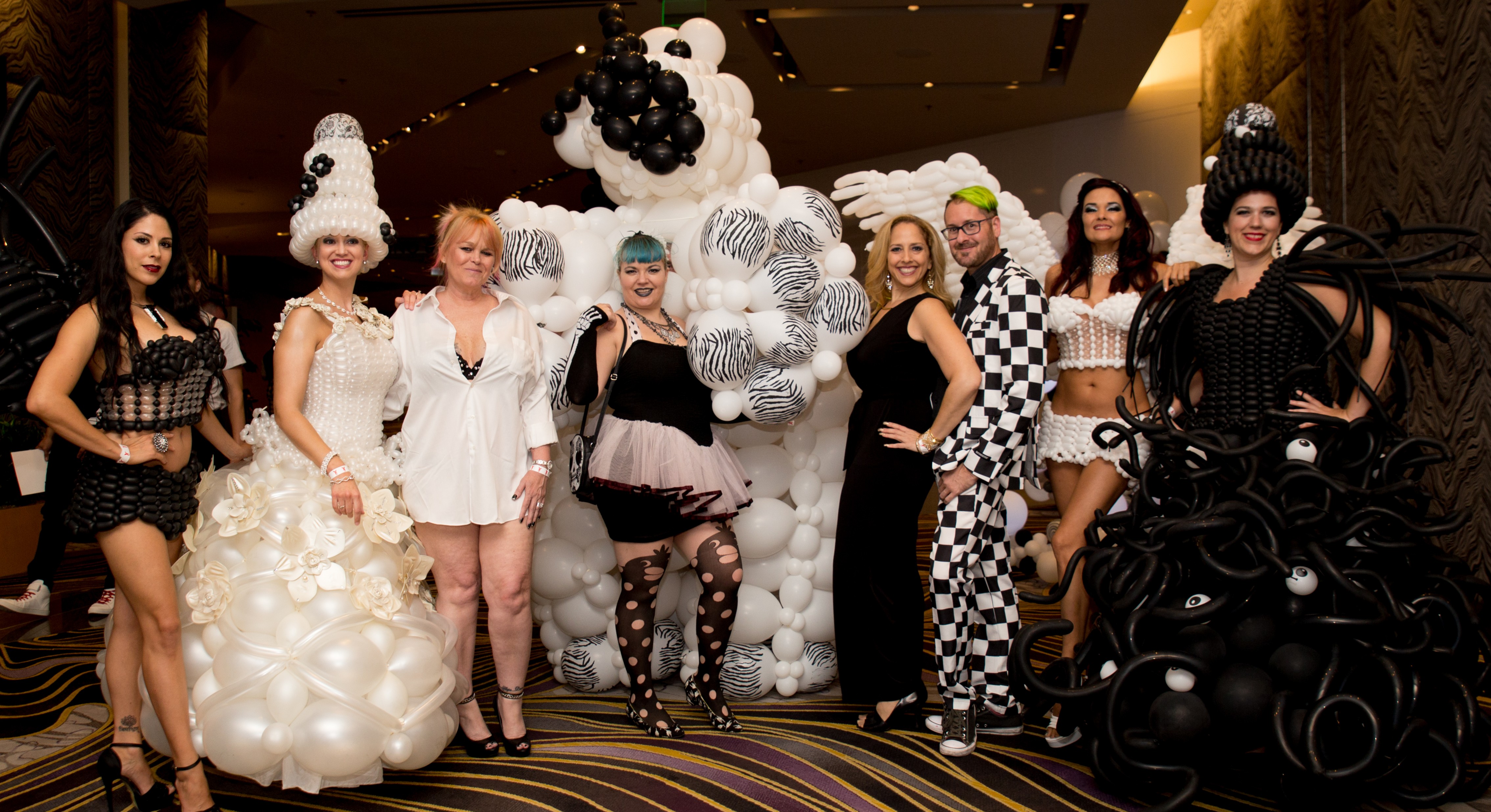 Guests don over-the-top fashions for Black & White Party.jpg